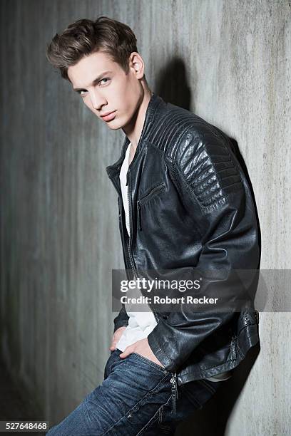 handsome young guy with leather jacket - leather jacket stock pictures, royalty-free photos & images