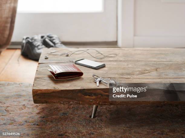 keys, wallet and cell phone on table. - wallet stock pictures, royalty-free photos & images