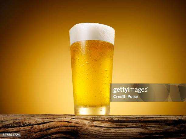 close-up of beer glass. - beer close up stock-fotos und bilder