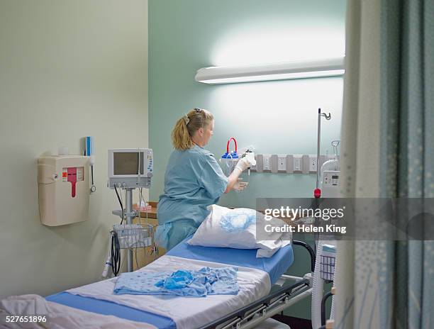 nurse in hospital room - hospital cleaning stock pictures, royalty-free photos & images