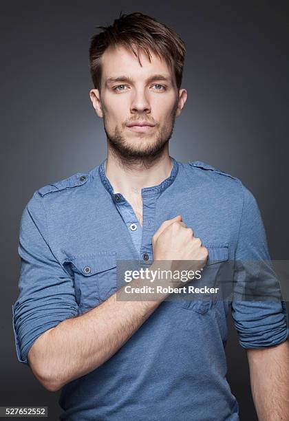 proud young man making oath gesture - chest torso stock-fotos und bilder