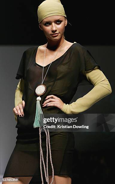 Model walks the runway at the Ready to Wear Show, Sample Only collection presentation during the Mercedes Australian Fashion Week May 6, 2005 in...