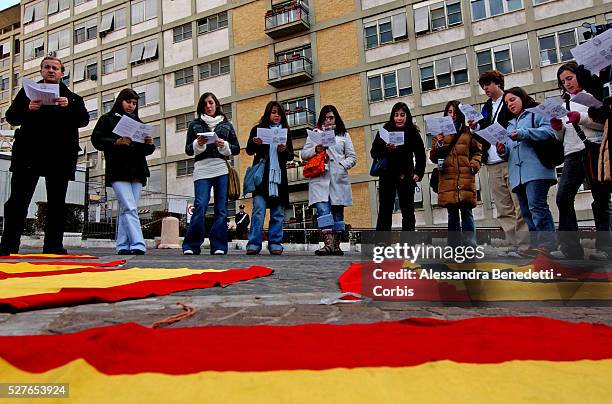 Spanish catholics pray in front of the Gemelli hospital of Rome. Pope John Paul II made his first appearance five days after his sudden...