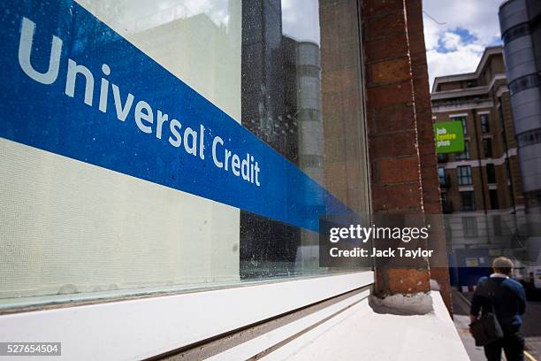 Universal Credit sign in the window of the Job Centre in Westminster on May 3, 2016 in London, England. The Resolution Foundation, chaired by former...