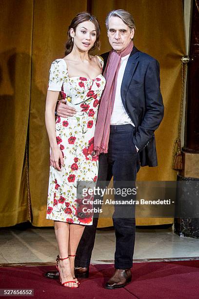 Olga Kurylenko and Jeremy Irons attend the photocall of movie "Corrispondence", La corrispondenza" in Rome.