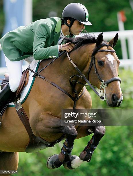 Rodrigo Pesseoa of Brasilia jumps on his horse Rockford during the Sony Ericsson Cup of the the German Jumping and Dressage Grand Prix on May 5, 2005...