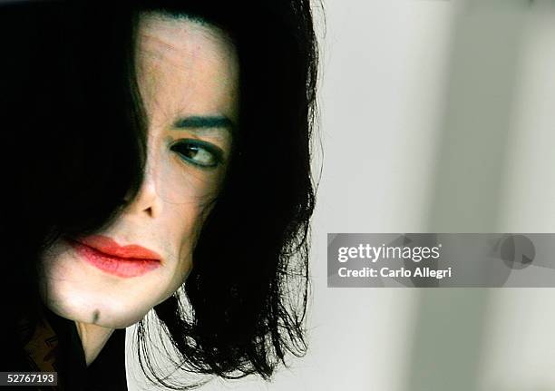 Singer Michael Jackson arrives at the Santa Barbara County Courthouse for the second day of the defense's case in his child molestation trial May 6,...