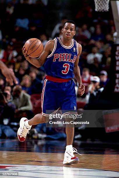Allen Iverson of the Philadelphia 76ers dribbles the ball upcourt against the New York Knicks during an NBA game at Madison Square Garden on November...