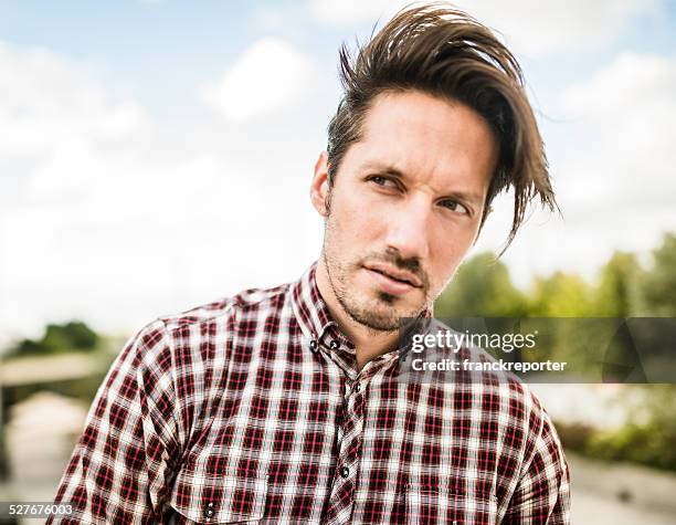 casual fashion model posing - emo guy stock pictures, royalty-free photos & images