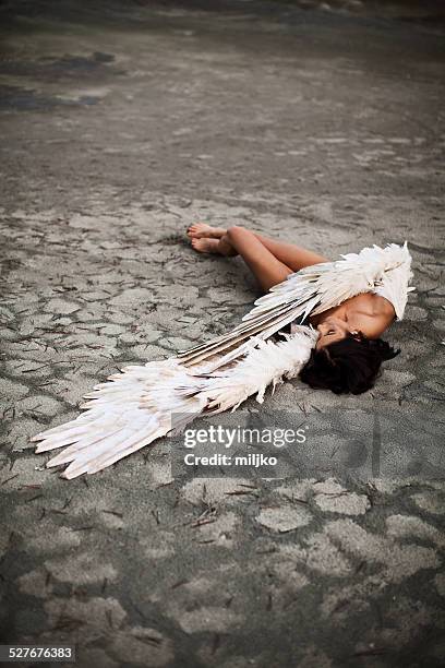 fallen angel - earth angel stock pictures, royalty-free photos & images