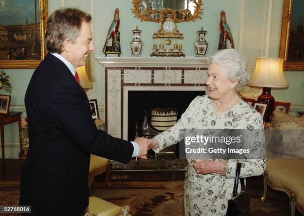 Newly re-elected Prime Minister Tony Blair shakes hands with Queen Elizabeth II during an engagement at Buckingham Palace May 6, 2005 in London....