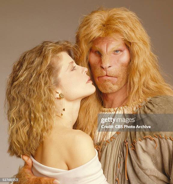 American actors Linda Hamilton and Ron Perlman pose for a promotional photo for their CBS television series 'Beauty and the Beast,' 1987.