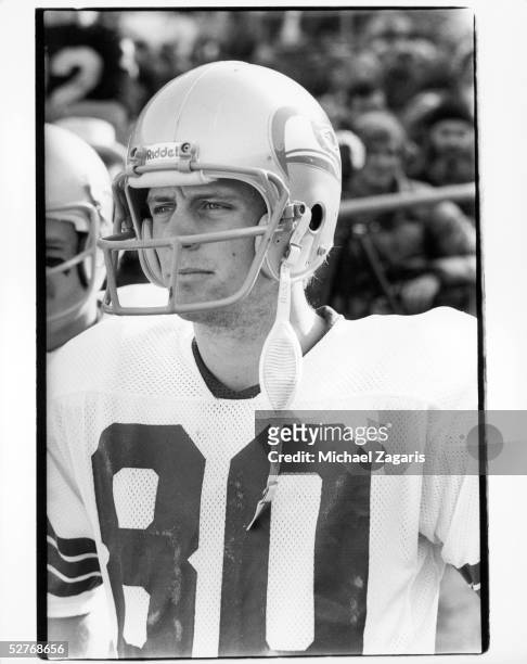 Wide receiver Steve Largent of the Seattle Seahawks watches the action from the sideline during a game against the Oakland Raiders at Oakland/Alameda...