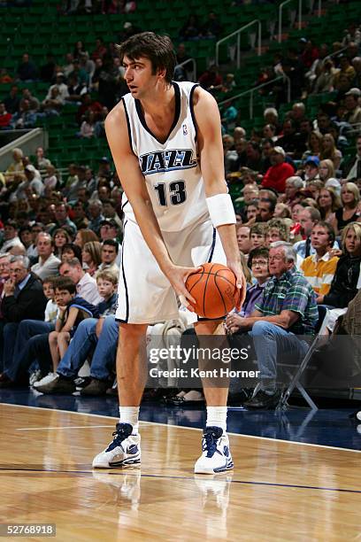 Mehmet Okur of the Utah Jazz holds the ball against the Portland Trail Blazers on April 5, 2005 at the Delta Center in Salt Lake City, Utah. The Jazz...