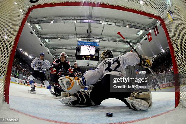 Richard Park of the USA takes a shot past goalkeeper Niklas Backstrom of Finland to score in the first period of the IIHF World Men's Championships...