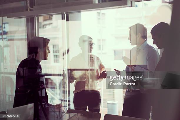 business people having discussion in modern office - business finance and industry stock pictures, royalty-free photos & images