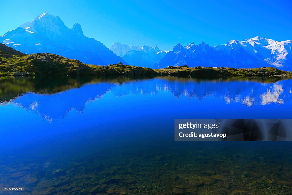 Mont Blanc Massif reflection and lake Cheserys, Chamonix, French Alps