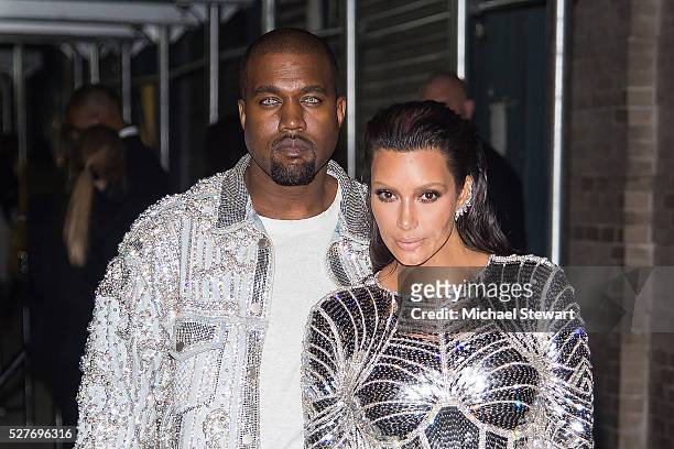 Rapper Kanye West and tv personality Kim Kardashian attend "Manus x Machina: Fashion in an Age of Technology" Costume Institute Gala Balmain after...