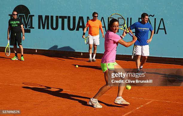 Silvia Soler Espinosa of Spain takes part in an Amex clinic during day four of the Mutua Madrid Open tennis tournament at the Caja Magica on May 03,...