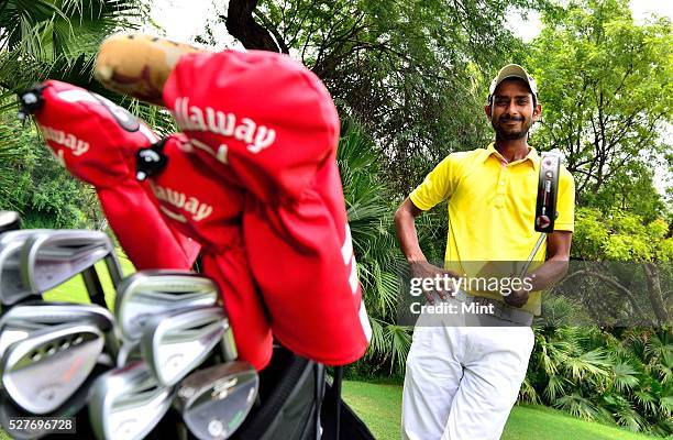 Golfer Rashid Khan poses for a profile shoot in Delhi Golf Club on August 18, 2015 in New Delhi, India.