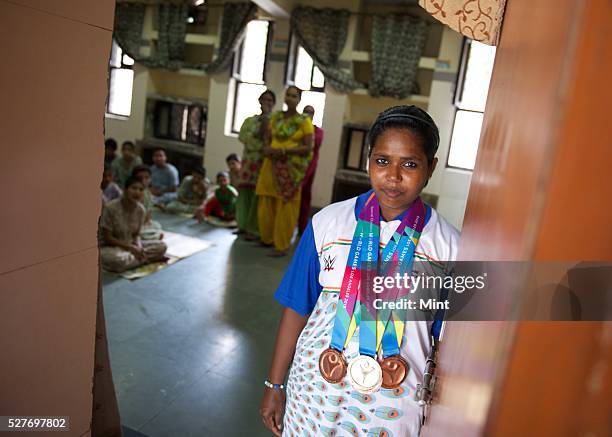 Special Olympics Gold and Bronze medalist Phoolan Devi poses for a profile shoot on August 14, 2015 in New Delhi, India. Phoolan Devi has an IQ of...