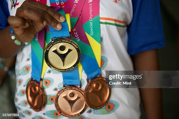 Special Olympics Gold and Bronze medalist Phoolan Devi poses for a profile shoot on August 14, 2015 in New Delhi, India. Phoolan Devi has an IQ of...