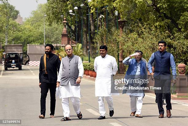 Finance Minister, Minister of Corporate Affairs Arun Jaitley, with Lieutenant-Colonel AVSM and I&B Minister Rajyavardhan Singh Rathore and other BJP...