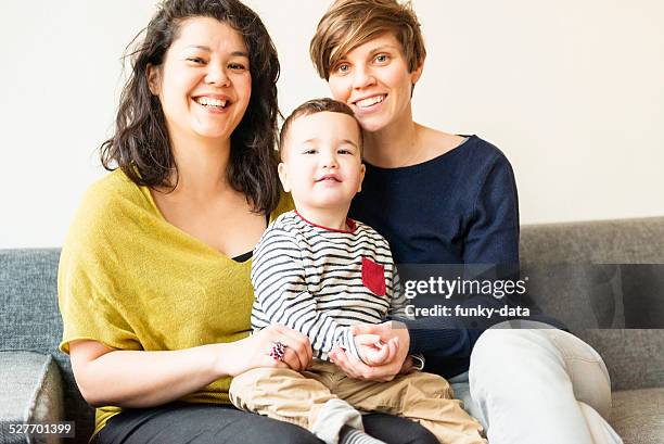 mixed race lesbian family portrait - lesbian mom stock pictures, royalty-free photos & images