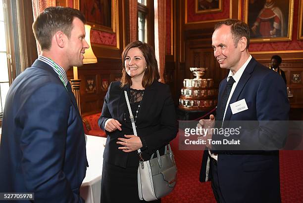 Aegon GB Davis Cup Captain, Leon Smith speaks to Caroline Ansell MP and Rob Cottrill during the Davis Cup Parliamentary Reception at Houses of...
