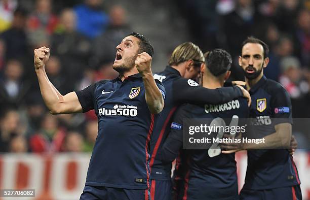 Koke of Atletico Madrid celebrates as Antoine Griezmann of Atletico Madrid scores their first goal during UEFA Champions League semi final second leg...