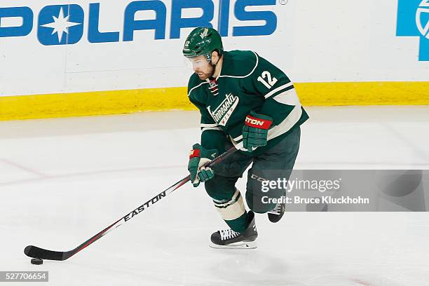 David Jones of the Minnesota Wild skates with the puck against the Dallas Stars in Game Four of the Western Conference First Round during the 2016...