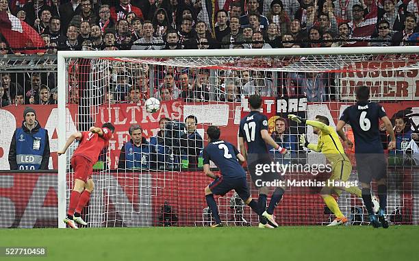 Robert Lewandowski of Bayern Munich scores their second goal with a header during UEFA Champions League semi final second leg match between FC Bayern...