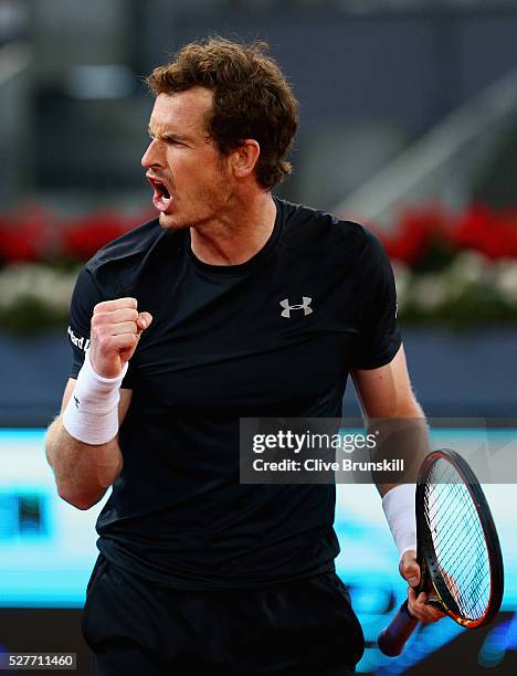 Andy Murray of Great Britain celebrates match point against Radek Stepanek of the Czech Republic in their second round match during day four of the...