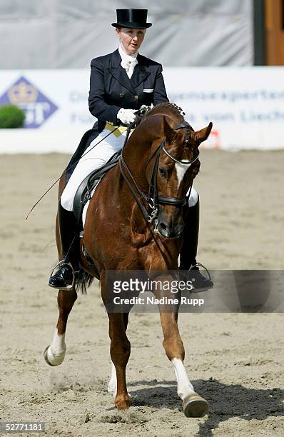 Kristy Oatley of Australia rides her horse Don Bolero during the Grand Prix Kuer Martin Freiherr von Jenisch of the German Jumping and Dressage Grand...