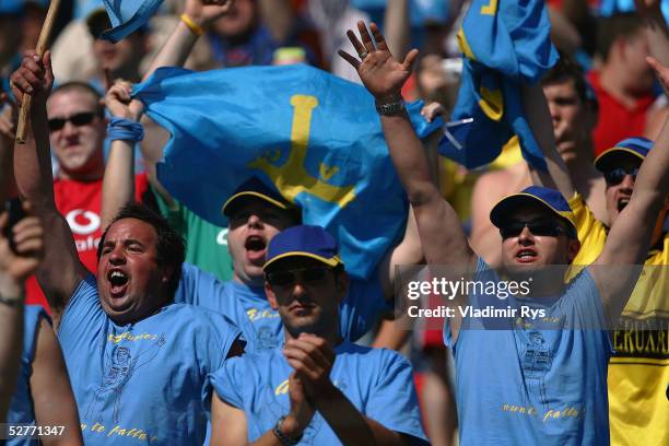 Fans of Fernando Alonso of Spain and Renault cheer during practice for the Spanish Formula 1 Grand Prix on May 7, 2005 in Barcelona, Spain.