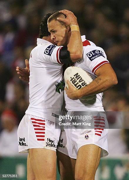 Matt Cooper of the Dragons celebrates a try during the round nine NRL match between the St George-Illawarra Dragons and the South Sydney Rabbitohs...