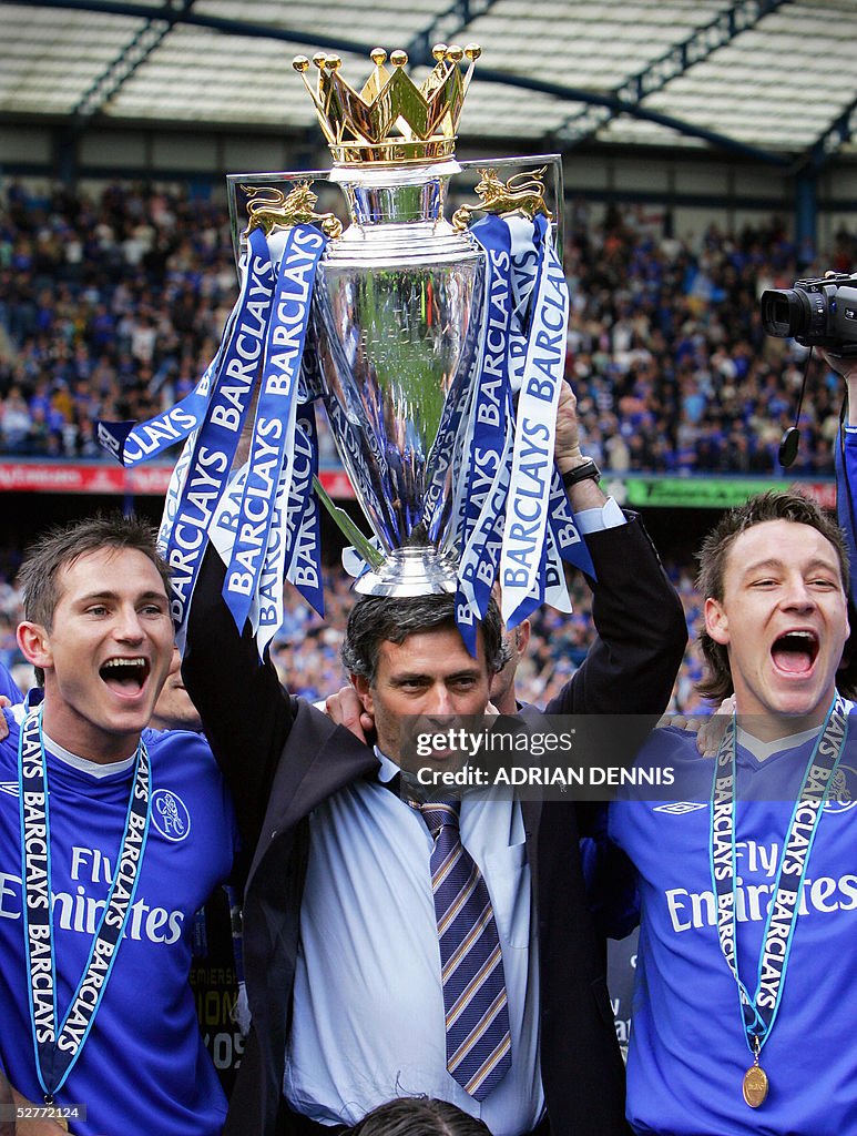 Chelsea's Manager Jose Mourinho (C) hold