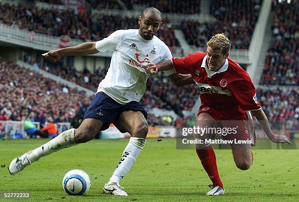 Freddie Kanoute of Tottenham holds off Franck Queudrue of Middlesbrough during the Barclays Premiership match between Middlesbrough and Tottenham...