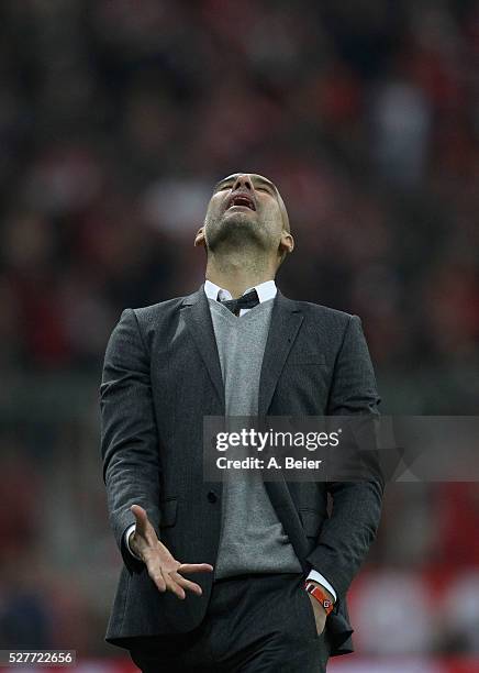 Team coach Josep Guardiola of Bayern Muenchen reacts during the Champions League semi final second leg match between FC Bayern Muenchen and Club...