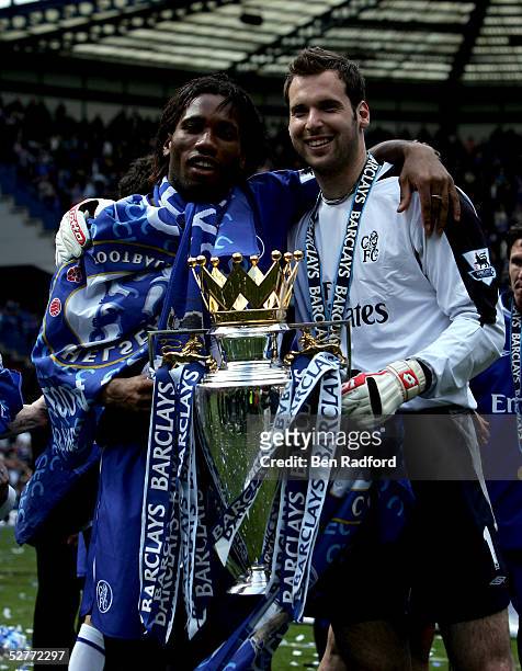 Didier Drogba and Peter Cech pose for the media after receiving the Barclays Premiership Trophy at Stamford Bridge on May 7, 2005 in London, England.