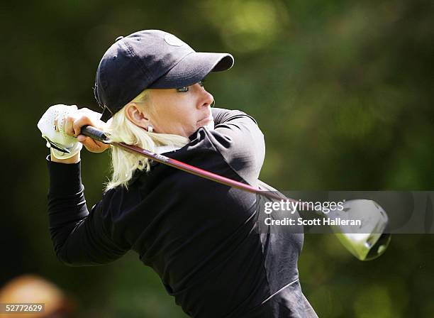 Danielle Amiee, winner of the Golf Channel's Big Break III, hits her tee shot on the ninth hole during the second round of the Michelob Ultra Open on...