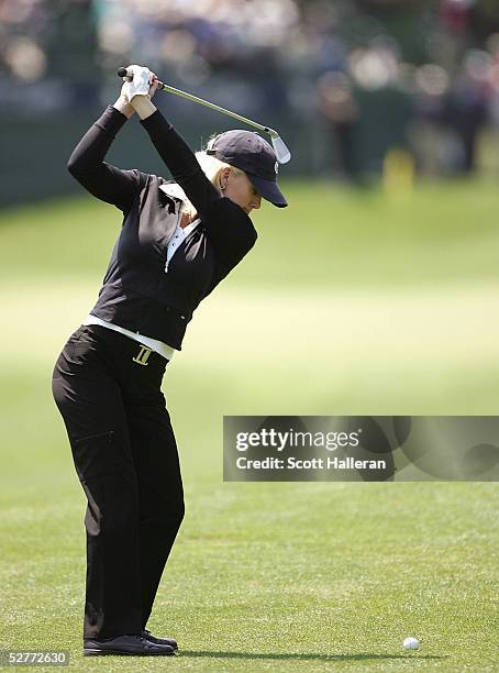 Danielle Amiee, winner of the Golf Channel's Big Break III, hits her approach shot on the ninth hole during the second round of the Michelob Ultra...