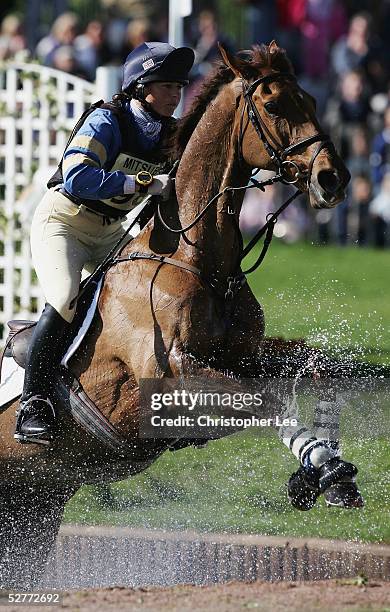 Jeanette Brakewell of Great Britain on Over To You clears the water jump in the Cross Country Test during the Mitsubishi Motors Badminton Horse...