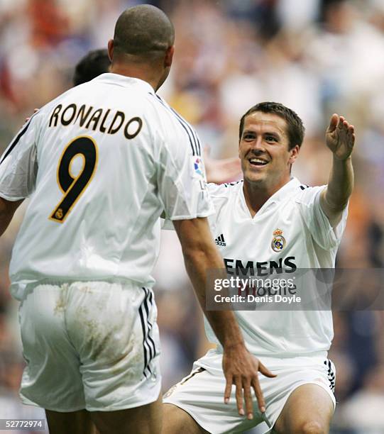 Real's Michael Owen celebrates his goal with Ronaldo during the La Liga match between Real Madrid and Racing de Santander at the Bernabeu on May 7,...