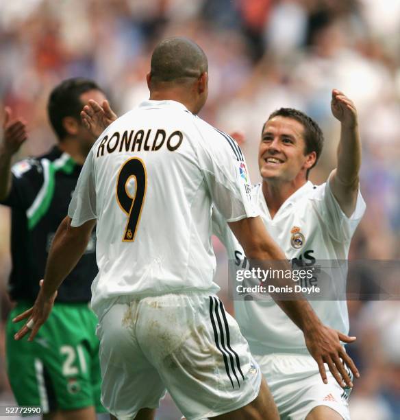 Real`s Michael Owen celebrates his goal with Ronaldo during a La Liga match between Real Madrid and Racing de Santander at the Bernabeu on May 7 in...