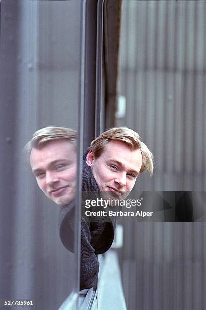 Film director Christopher Nolan, photographed in his hotel room in New York City on 12th December 2000. His new film, 'Memento,' will be released in...
