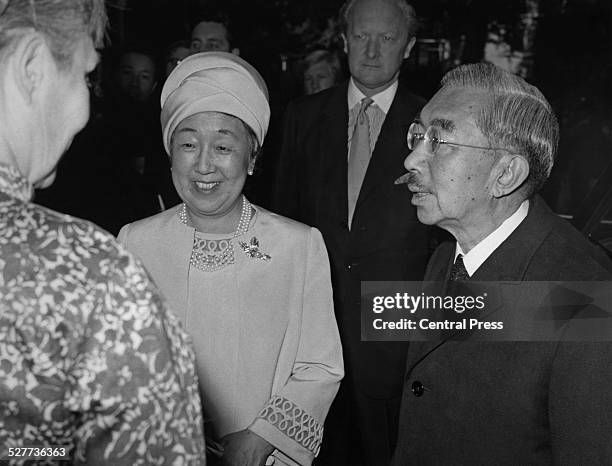 Emperor Hirohito and Empress Nagako of Japan visit the Royal Society in Carlton House Terrace, during of a three-day visit to London, 6th October...