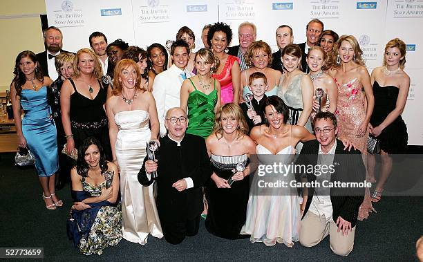 The cast of "Coronation Street" poses in the pressroom with the prize for Best British Soap at the British Soap Awards 2005 at BBC Television Centre...