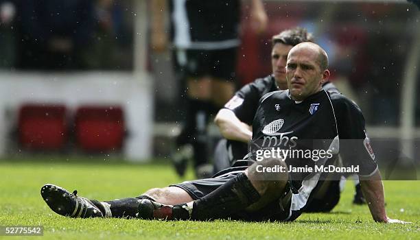 Gillingham captain Paul Smith looks dejected as he sees his team relegated to the First Division during the Coca Cola Championsip match between...