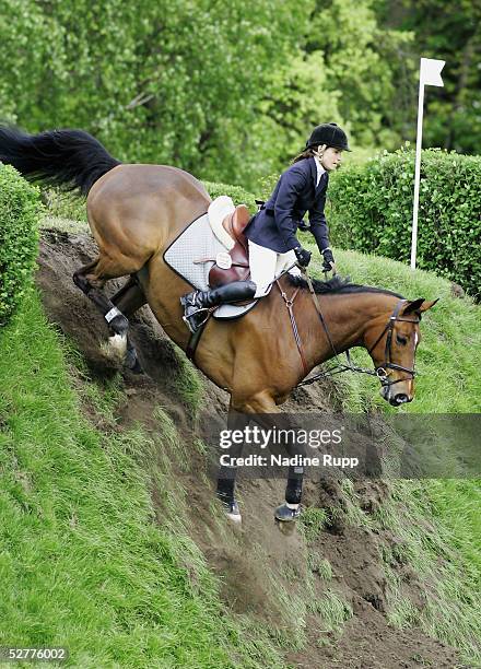 Hamburgs Yvonne Dude of Germany jumps on her horse United MG during the 76. German Jumping-Derby 2005 of the German Jumping and Dressage Grand Prix...